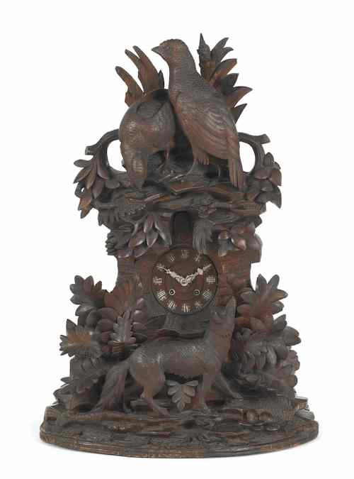 Appraisal: Ornate Black Forest cuckoo clock with fox chasing fowl h