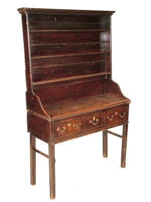 Appraisal: An th century style oak dresser with moulded cornice above