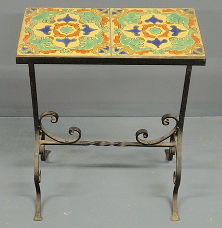 Appraisal: Wrought iron garden table with a double-tile top h top