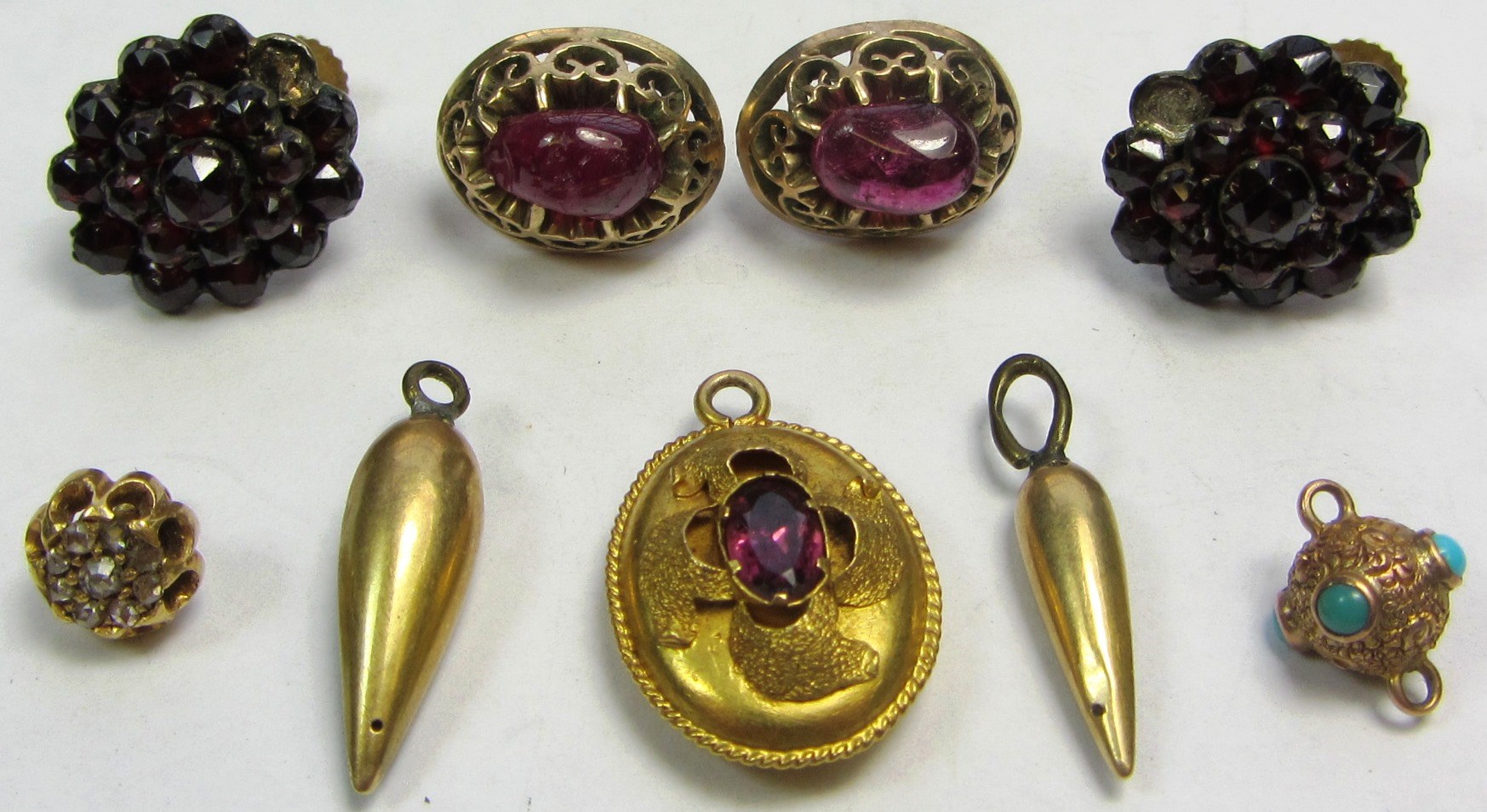 Appraisal: A pair of Bohemian garnet set cluster earrings a pair