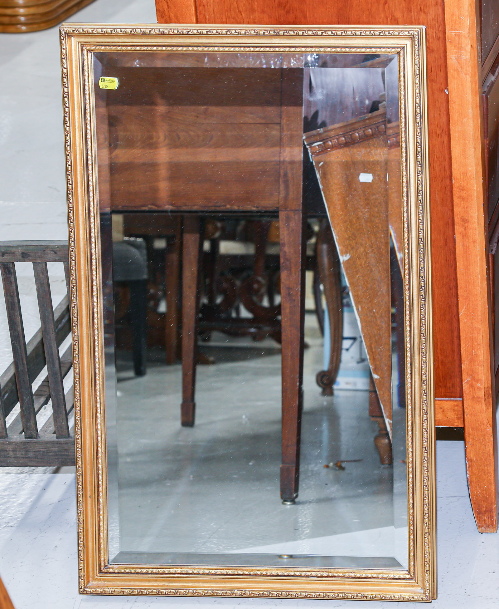 Appraisal: GILT FRAMED MIRROR Modern with beveled glass x in