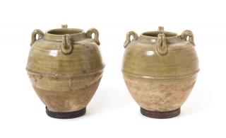 Appraisal: A Pair of Green Glazed Pottery Jars A Pair of