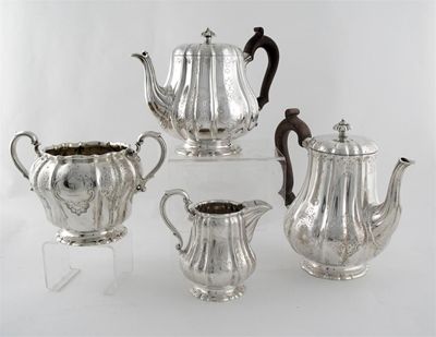 Appraisal: A Victorian four piece tea service the fluted baluster bodies