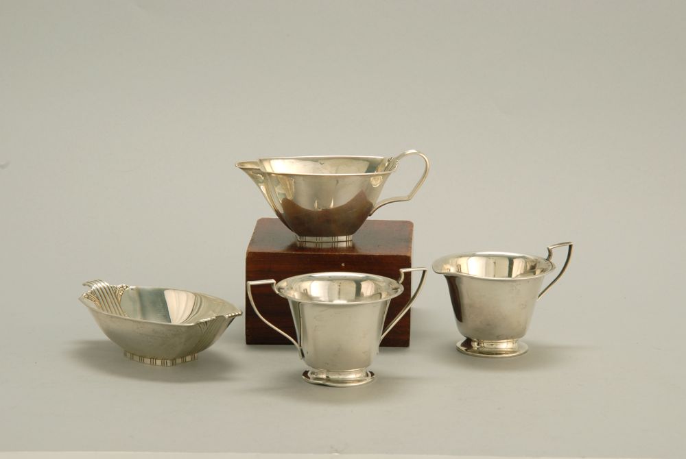 Appraisal: TWO STERLING SILVER CREAM AND SUGAR SETS One by Watrous