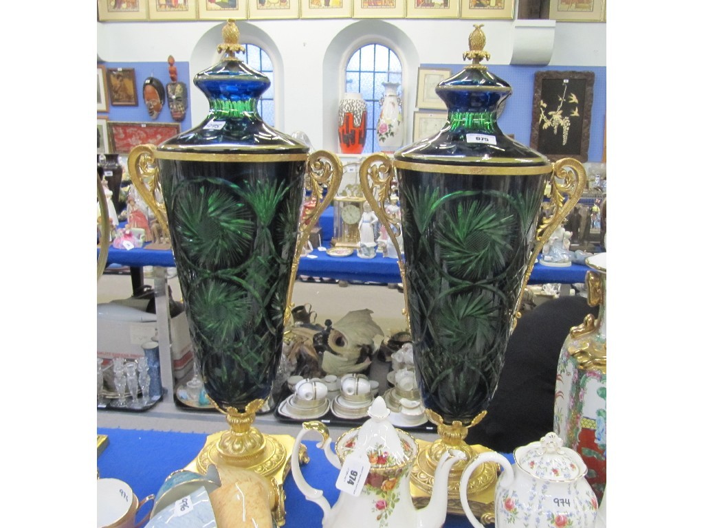 Appraisal: Large pair of blue flashed green cut glass vases and