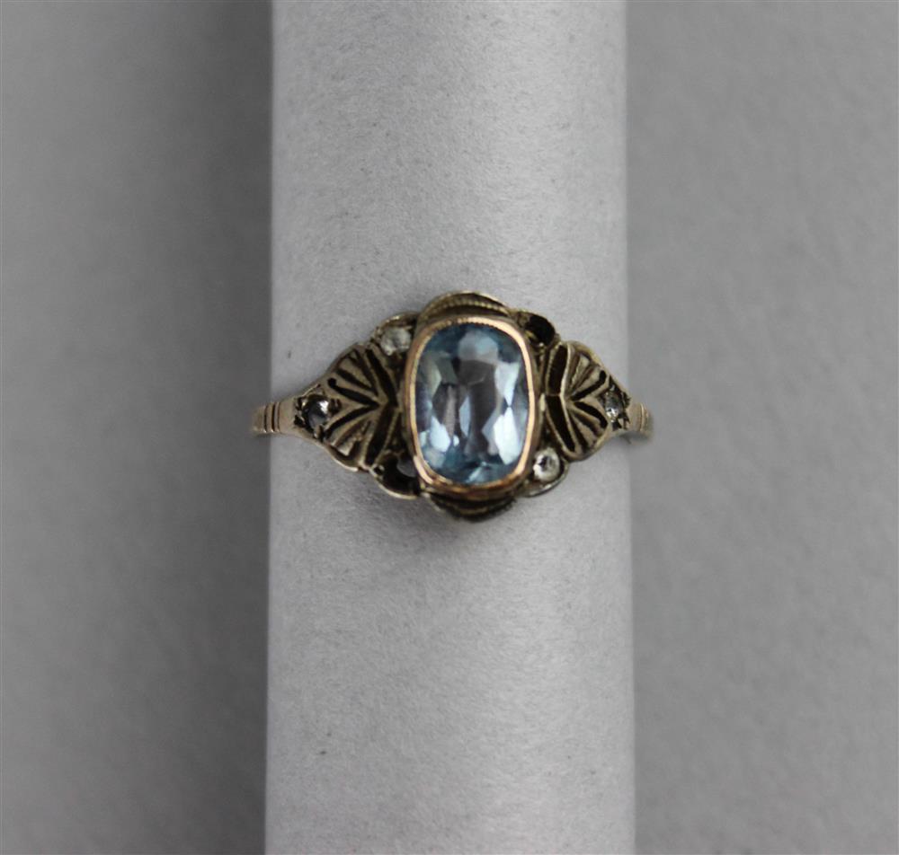 Appraisal: DELICATE LADY'S GOLD AND AQUAMARINE RING maker's mark inside shank