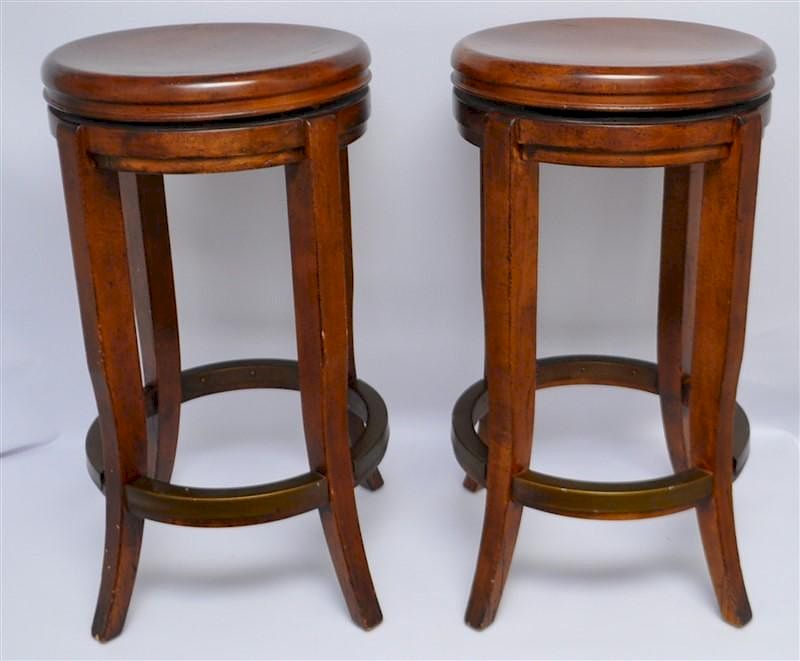 Appraisal: MAHOGANY SWIVEL STOOLS Two Matching Better Quality Mahogany Swivel Stools