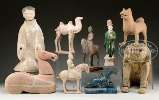 Appraisal: LARGE LOT OF POTTERY STATUES WITH CARVED WOOD DOG th