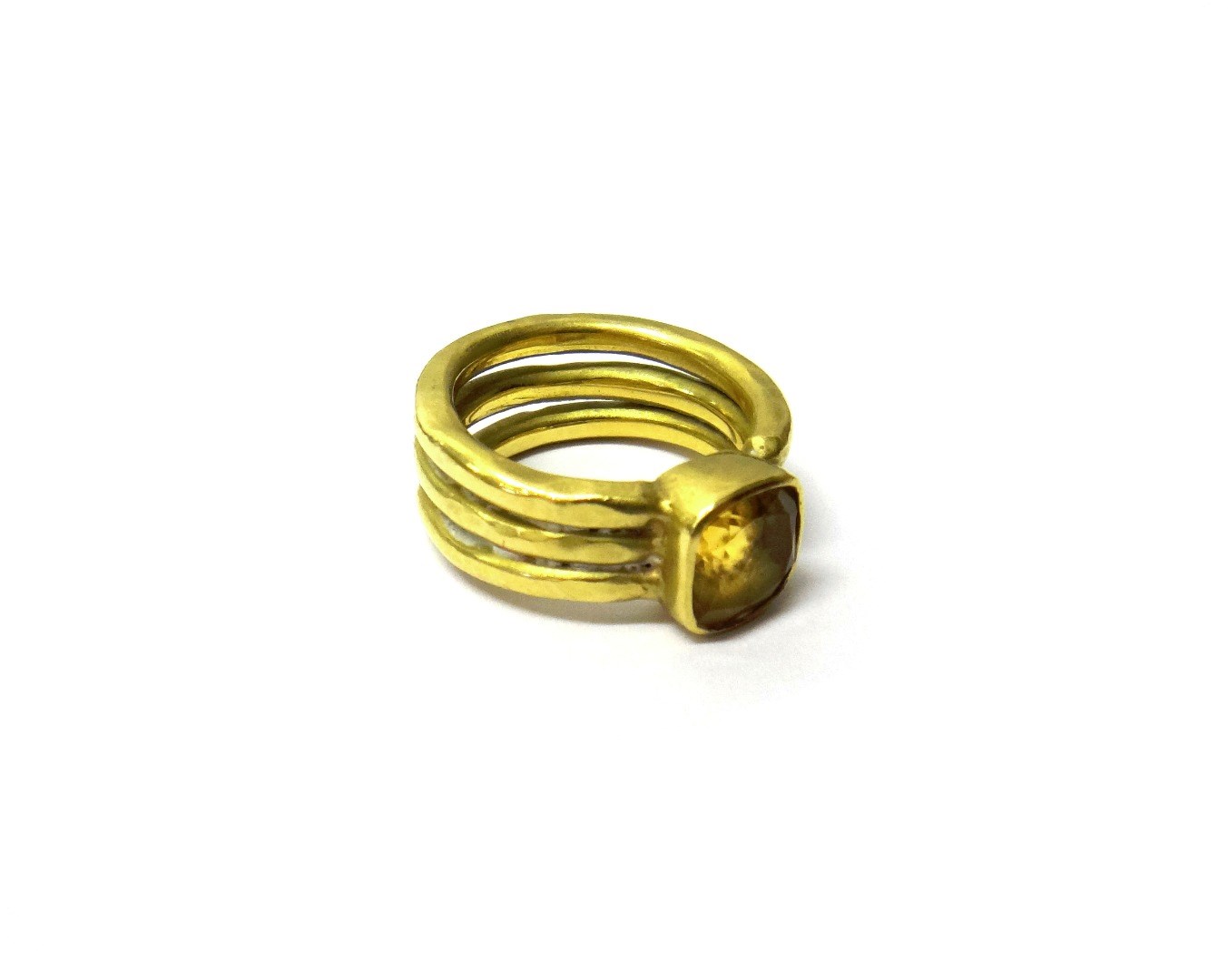 Appraisal: A gold ring mounted with a cushion shaped citrine the