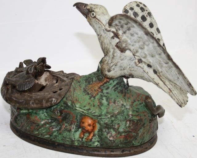 Appraisal: J E STEVENS CA CAST IRON MECHANICALBANK EAGLE AND EAGLETS