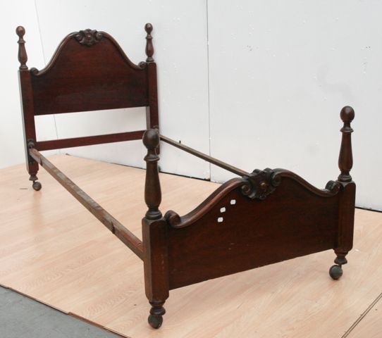 Appraisal: A pair of Victorian mahogany single beds