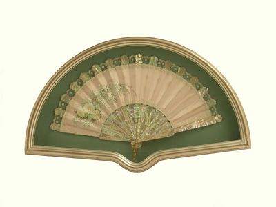 Appraisal: A fan c with plain mother of pearl sticks with