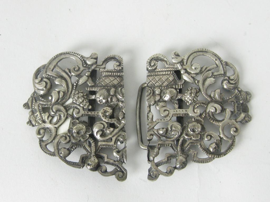 Appraisal: A Victorian large Buckle with floral and scroll pierced design