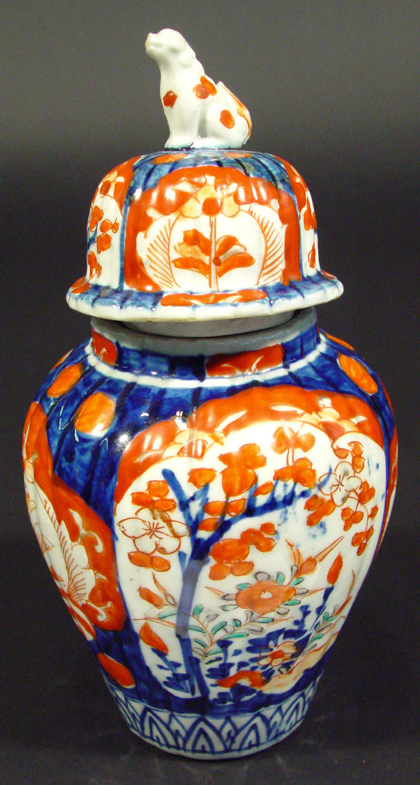 Appraisal: Japanese Imari porcelain jar and cover the lid with dog