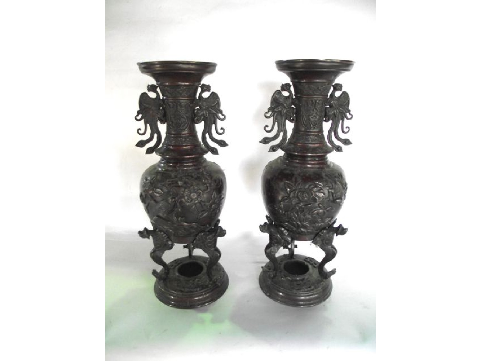 Appraisal: A pair of Chinese cast bronze vases of baluster form