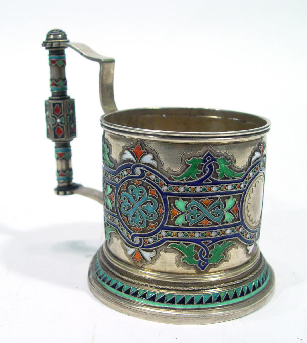 Appraisal: Russian silver tea glass holder with enamelled stylized decoration foundary