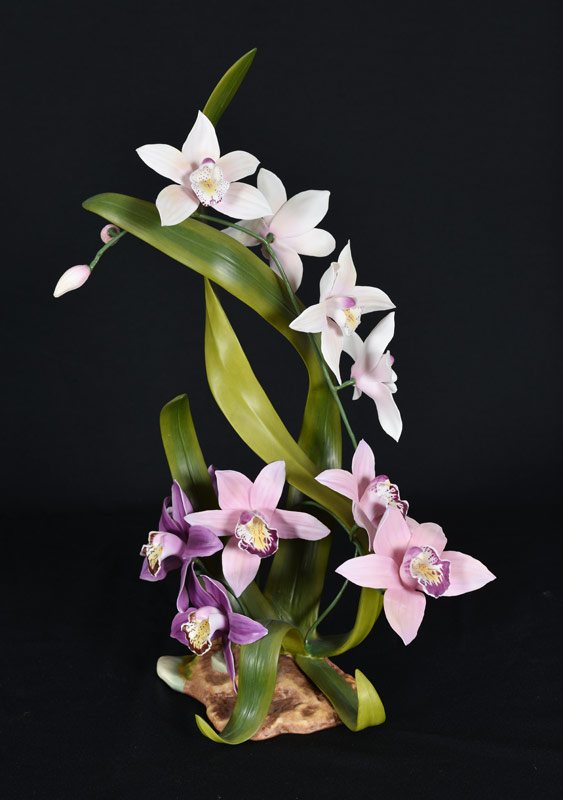 Appraisal: BOEHM PORCELAIN CYMBIDIUM ORCHID SCULPTURE Figurine of a Cymbidium Orchid