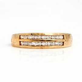 Appraisal: A ct gold channel set round brilliant cut diamond ring