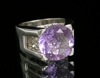 Appraisal: A Sterling Silver and Amethyst Ring An interesting sterling silver