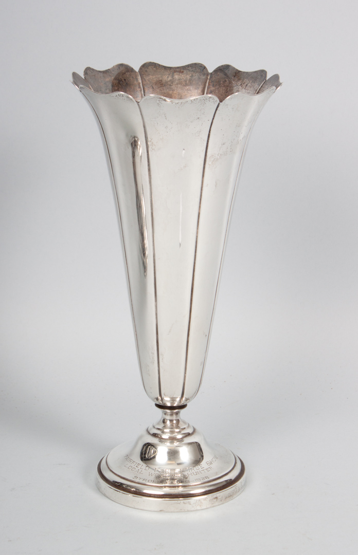 Appraisal: Watson weighted sterling silver trumpet vase in H with prize