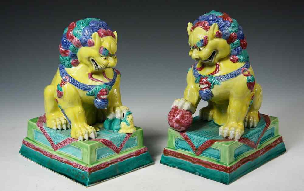 Appraisal: PR CHINESE POTTERY FOO DOGS - th c Polychrome Glazed