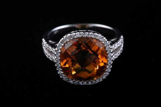 Appraisal: K WHITE GOLD CITRINE AND DIAMOND FASHION RING Cushion shaped