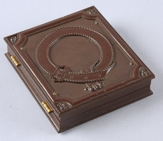 Appraisal: Sixth plate union case Belt Buckle Krainik- Case contains daguerreotype