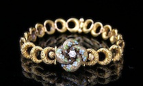 Appraisal: Late Victorian Lover's Knot Bracelet Unmarked yellow gold crescent link