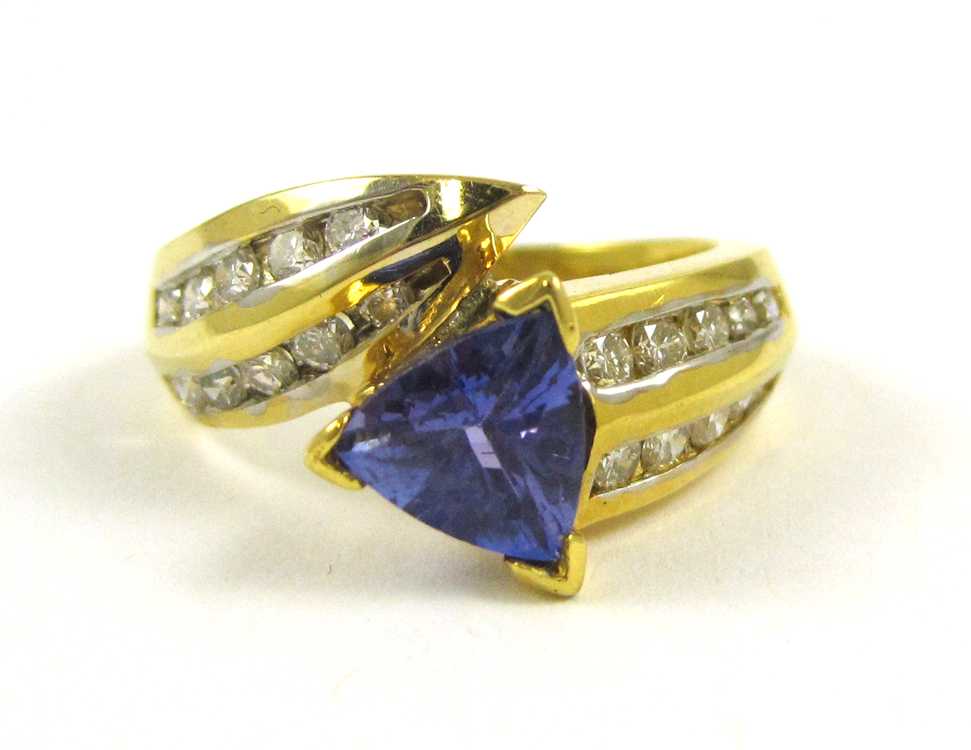 Appraisal: LEVIAN TANZANITE AND EIGHTEEN KARAT GOLD RING with two rows