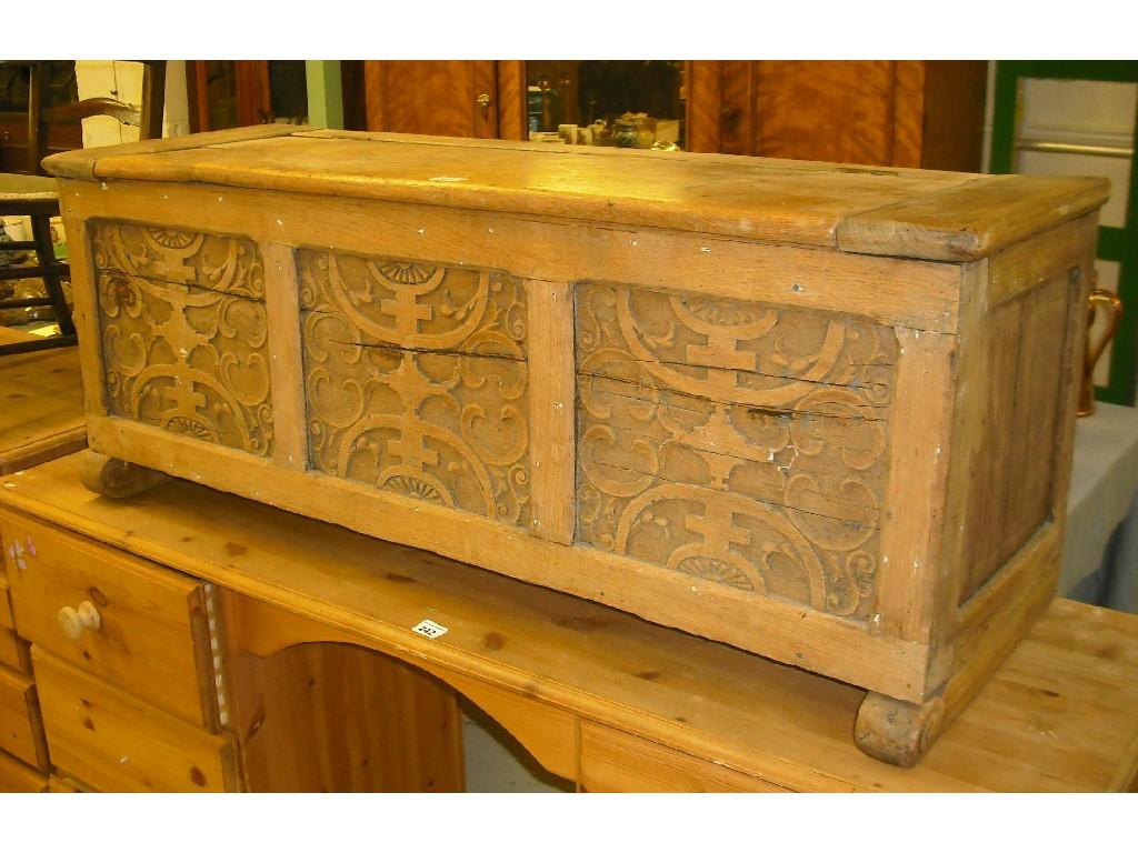 Appraisal: Continental light oak coffer the hinged top over three geometric