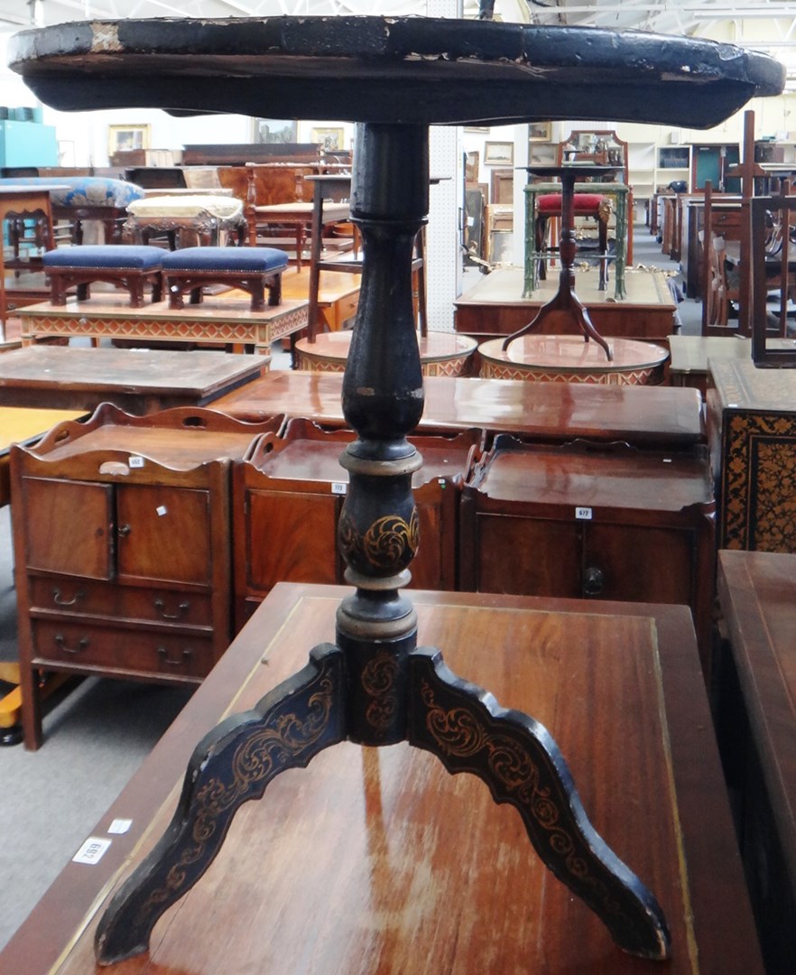 Appraisal: A th century continental ebonised tripod occasional table the circular