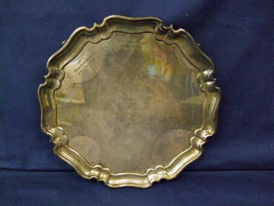 Appraisal: George V silver salver on scroll feet and with presentation