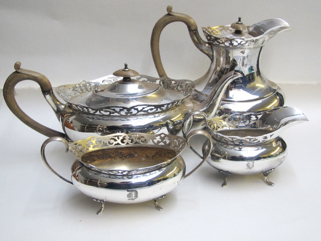 Appraisal: A plated four piece tea service with pierced rims comprising