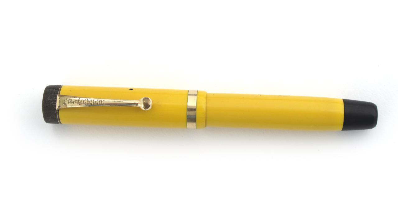 Appraisal: A Parker Mandarin Yellow Duofold Junior button-filler fountain