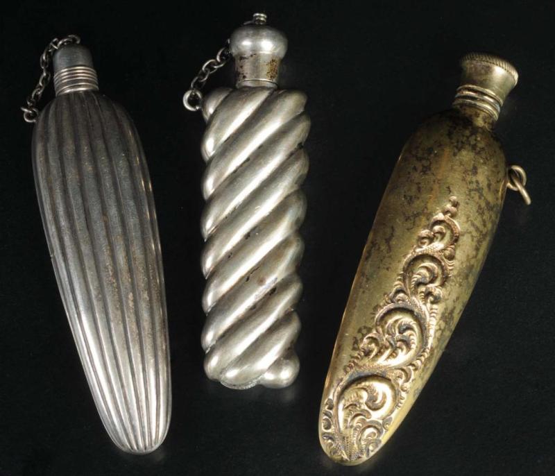 Appraisal: Lot of Antique Sterling Silver Perfume Bottles Condition Excellent Size