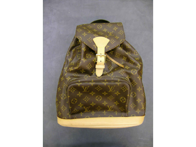 Appraisal: Louis Vuitton Monogram backpack with buckle closure draw string in