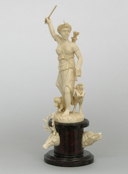 Appraisal: A Continental Carved Ivory Diana and Her Hounds Figurine A