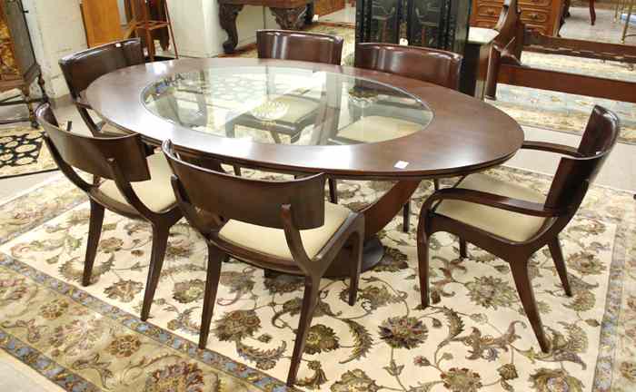 Appraisal: CONTEMPORARY DINING TABLE AND CHAIR SET ''Luna Collection'' by Brownstone