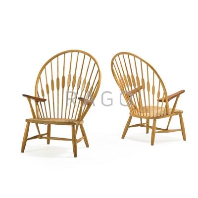 Appraisal: HANS WEGNER Pair of Peacock chairs Condition Report