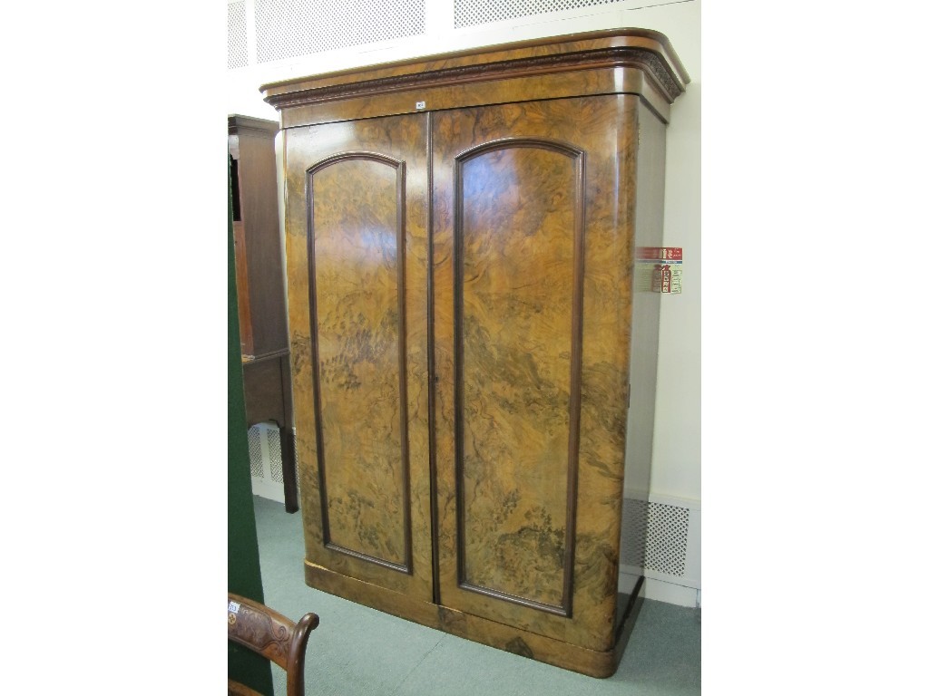 Appraisal: A Victorian burr walnut two door wardrobe cm high