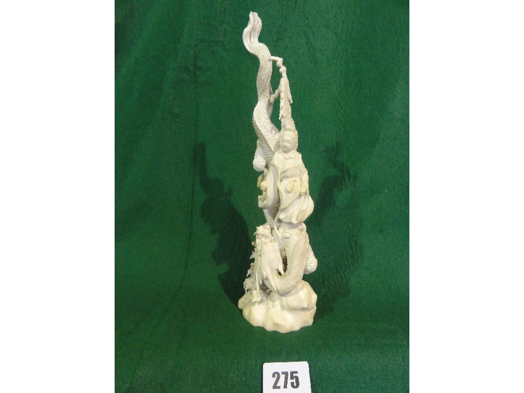 Appraisal: A th century Japanese ivory carving of female standing on