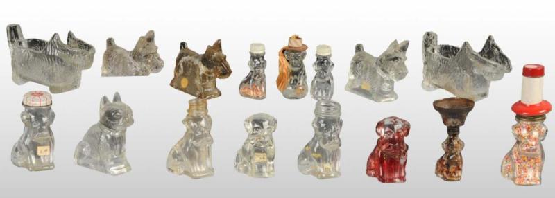 Appraisal: Lot of Glass Dog Candy Containers Description Several are missing