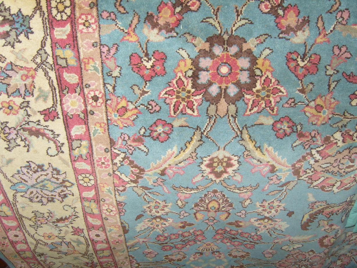 Appraisal: A blue ground wool carpet in the Persian style with