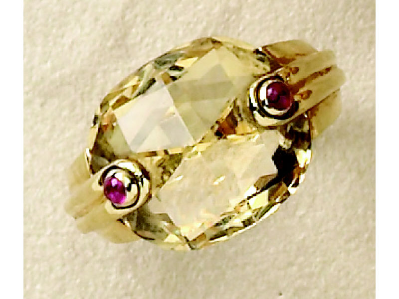 Appraisal: CITRINE AND RUBY RING k yellow gold ring with one