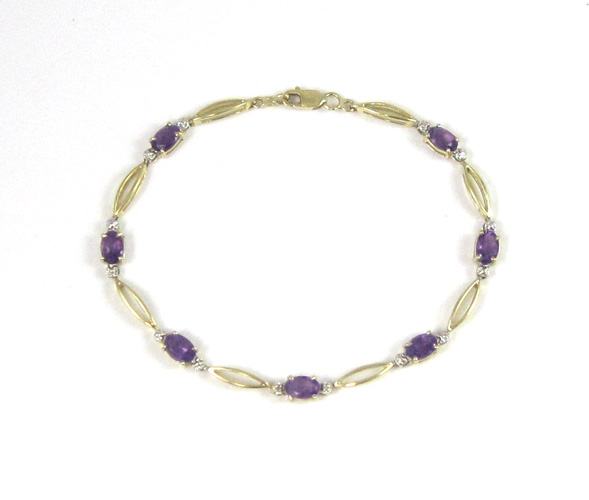 Appraisal: AMETHYST AND TEN KARAT GOLD BRACELET measuring - inches in