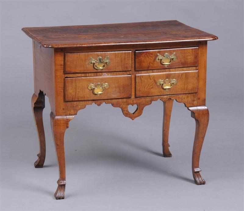 Appraisal: PENNSYLVANIA QUEEN ANNE FIGURED MAPLE DRESSING TABLE The two-plank molded