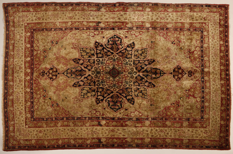 Appraisal: A Persian Lavar Kirman woolen carpet rug A Persian Lavar