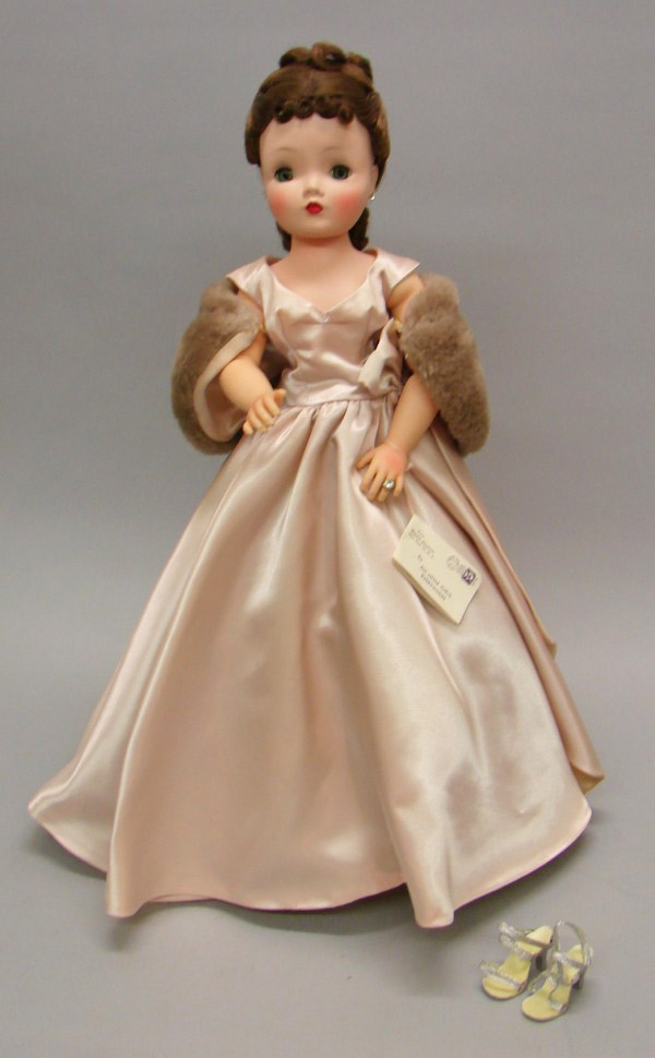 Appraisal: Cissy doll in tagged gown style Beautiful hard plastic doll