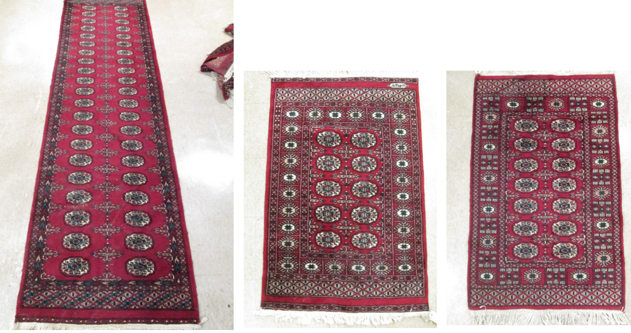 Appraisal: THREE RED FIELD BOKHARA AREA RUGS all hand knotted sizes