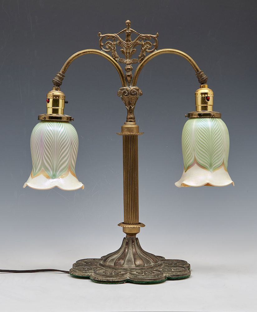 Appraisal: Brass table lamp with signed Quezal pulled feather shades Brass